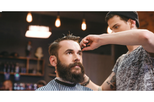 A stylish cutting the hair