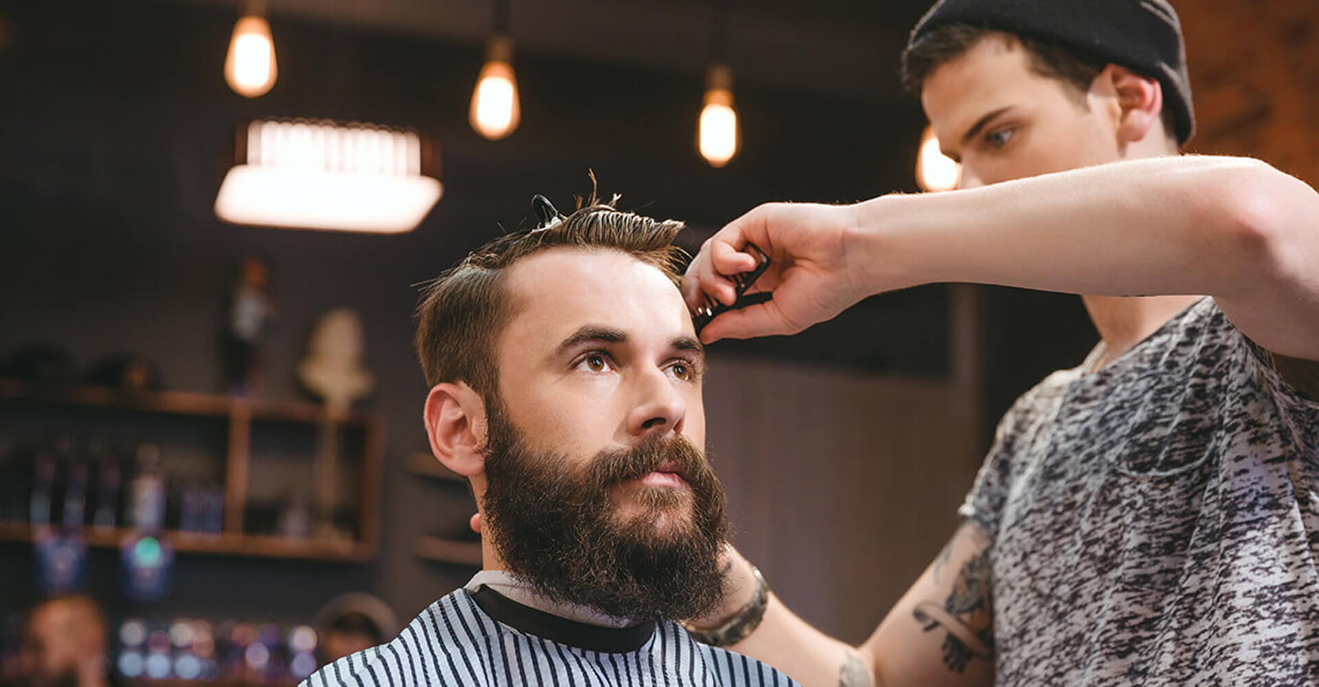 A stylish cutting the hair